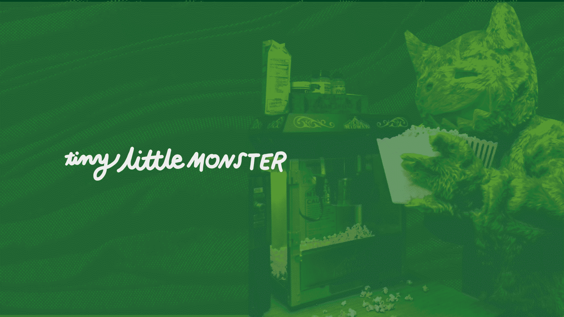 A green, furry monster figure is holding a container of popcorn next to a popcorn machine, with scattered popcorn on the ground. The background is predominantly green with a textured pattern, and the text reads "tiny little MONSTER" in white cursive and bold font.