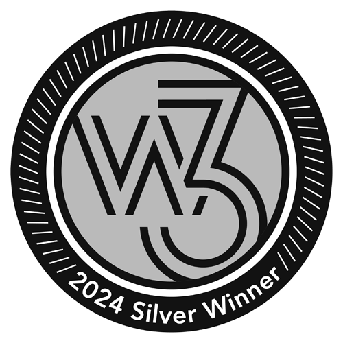 A circular emblem with "W3" in the center on a gray background. The text "2024 Silver Winner" encircles the bottom, with a dotted border around the edge.