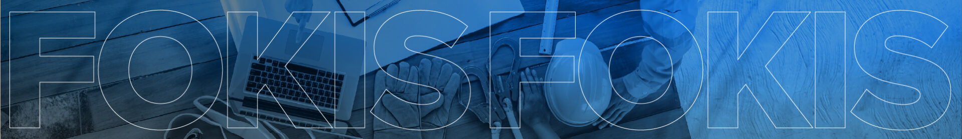 A top-down view of a workspace with a laptop, notebook, pen, and coffee cup on a wooden table. The word "FOKIS" is overlaid in large, transparent letters across the image.